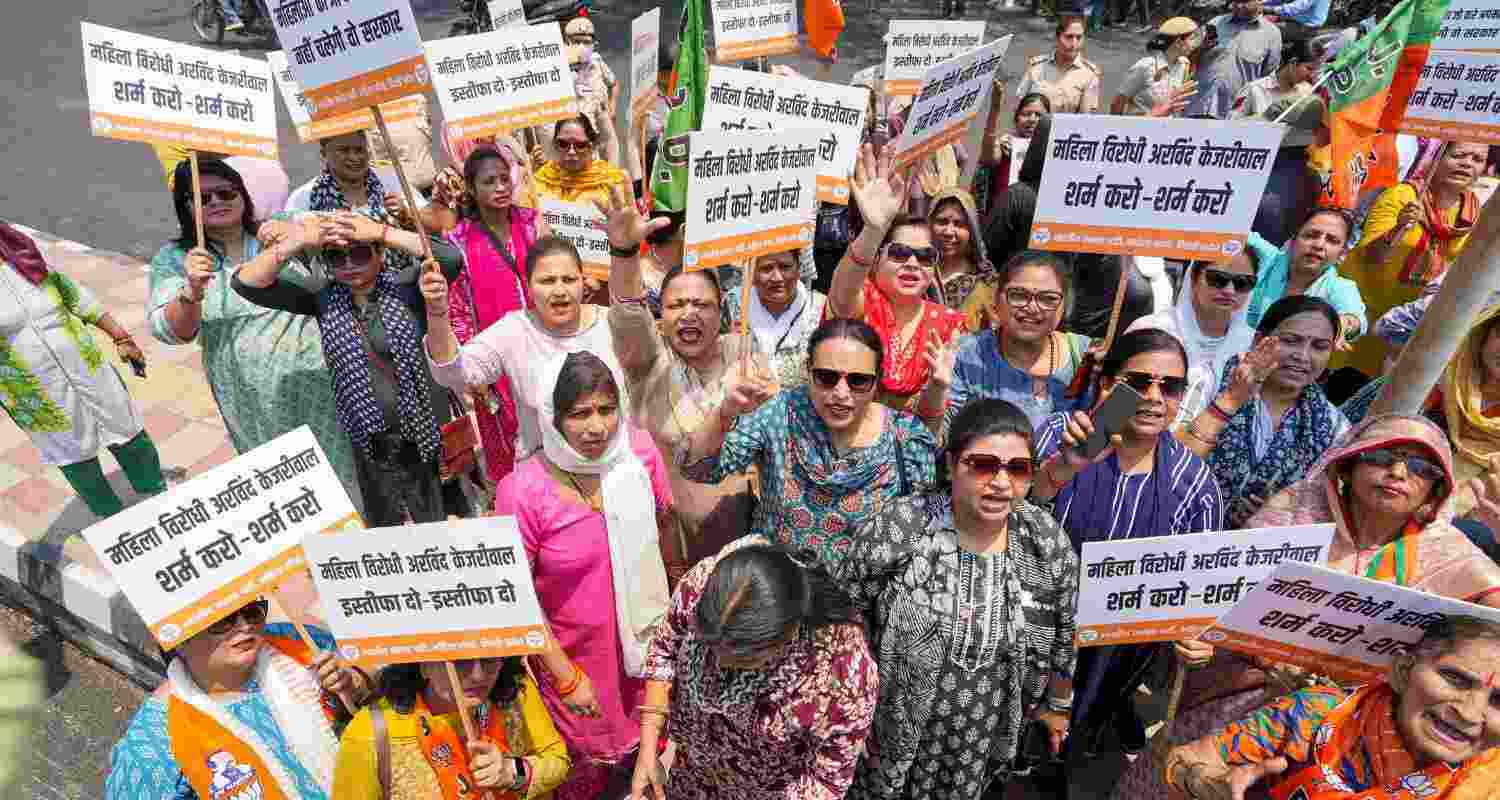 BJP women workers stage a protest against Delhi Chief Minister Arvind Kejriwal, in New Delhi, Wednesday. 