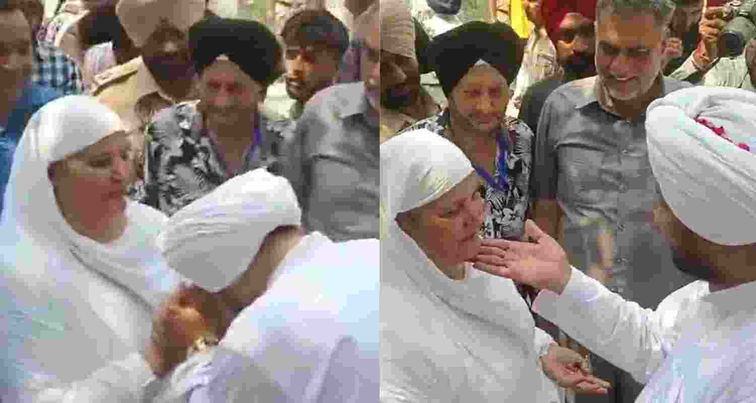 Visuals from the video, when Congress leader Channi bowed and touched SAD leader Jagir Kaur's chin.  