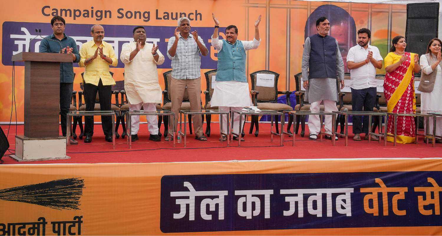 AAP leaders Sanjay Singh and Gopal Rai with others at the party's campaign song launch. 