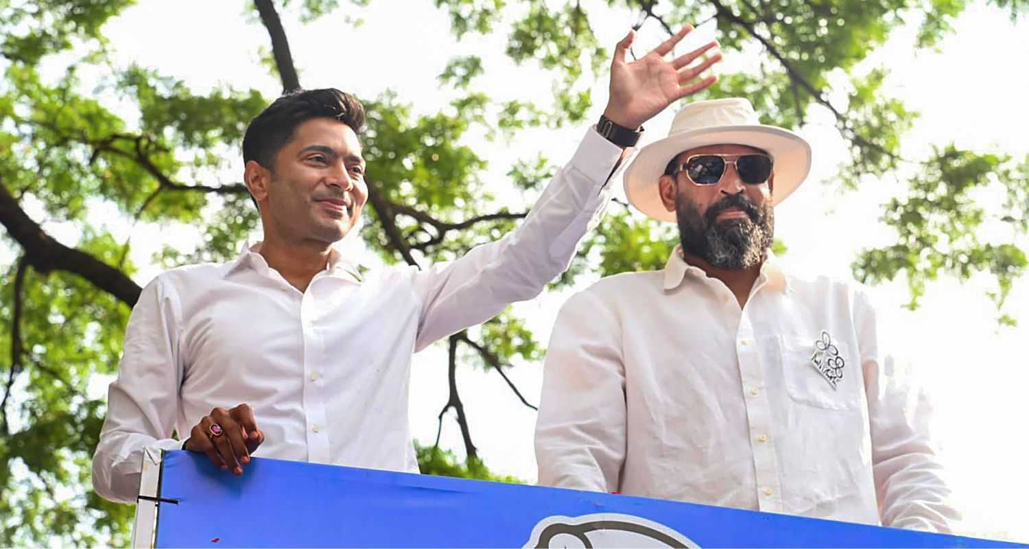 Abhishek Banerjee with the TMC's candidate from Berhampore constituency Yusuf Pathan.