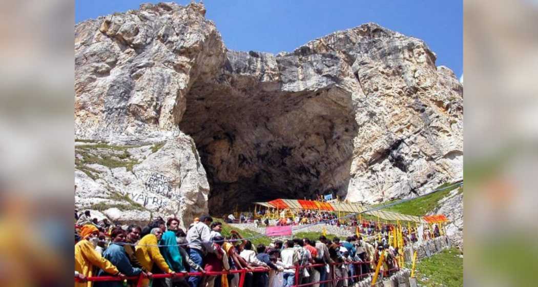 Devotees gather at the Amarnath Cave Shrine as the holy mace of Lord Shiva arrives, marking the conclusion of the 52-day pilgrimage.