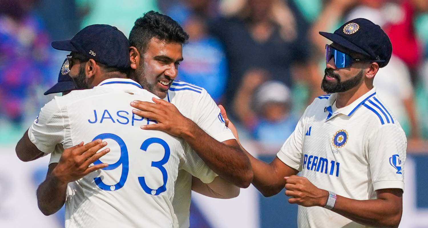 India's Ravichandran Ashwin celebrates with teammates after taking the wicket of England's Zak Crawley on the second day of the third test cricket match between India and England, at the Niranjan Shah Stadium, in Rajkot. 