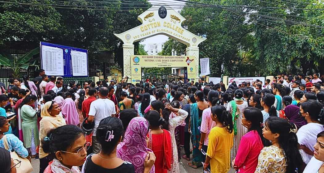 Aspiring candidates of Assam Direct Recruitment Examination (ADRE) wait to enter an examination hall to appear in the examination for the Assam Government Grade-3 jobs, in Guwahati, Sunday, Sept. 15, 2024.