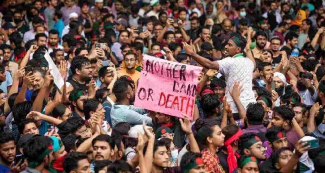 Protesters march in Dhaka, demanding the resignation of Prime Minister Sheikh Hasina.