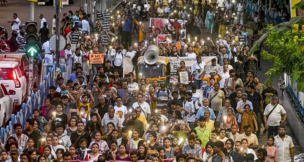 People take part in a protest march against the alleged sexual assault and murder of a trainee doctor, in Kolkata, on Saturday, August 31, 2024.