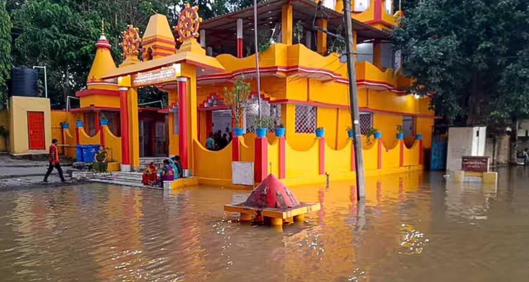 A September 19 photo of partially submerged premises of Alakhnath Temple following a rise in the water level of Ganga river, at Barh in Patna district of Bihar.