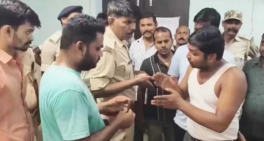 Relatives of the victim explain their situation to the police at the hospital in Supaul on Wednesday.