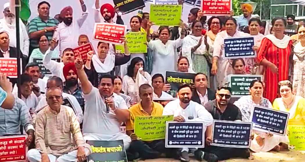 Congress leaders in Chandigarh demand SEBI chief Madhabi Buch's resignation and a JPC probe into the Adani issue during a protest on Thursday. 