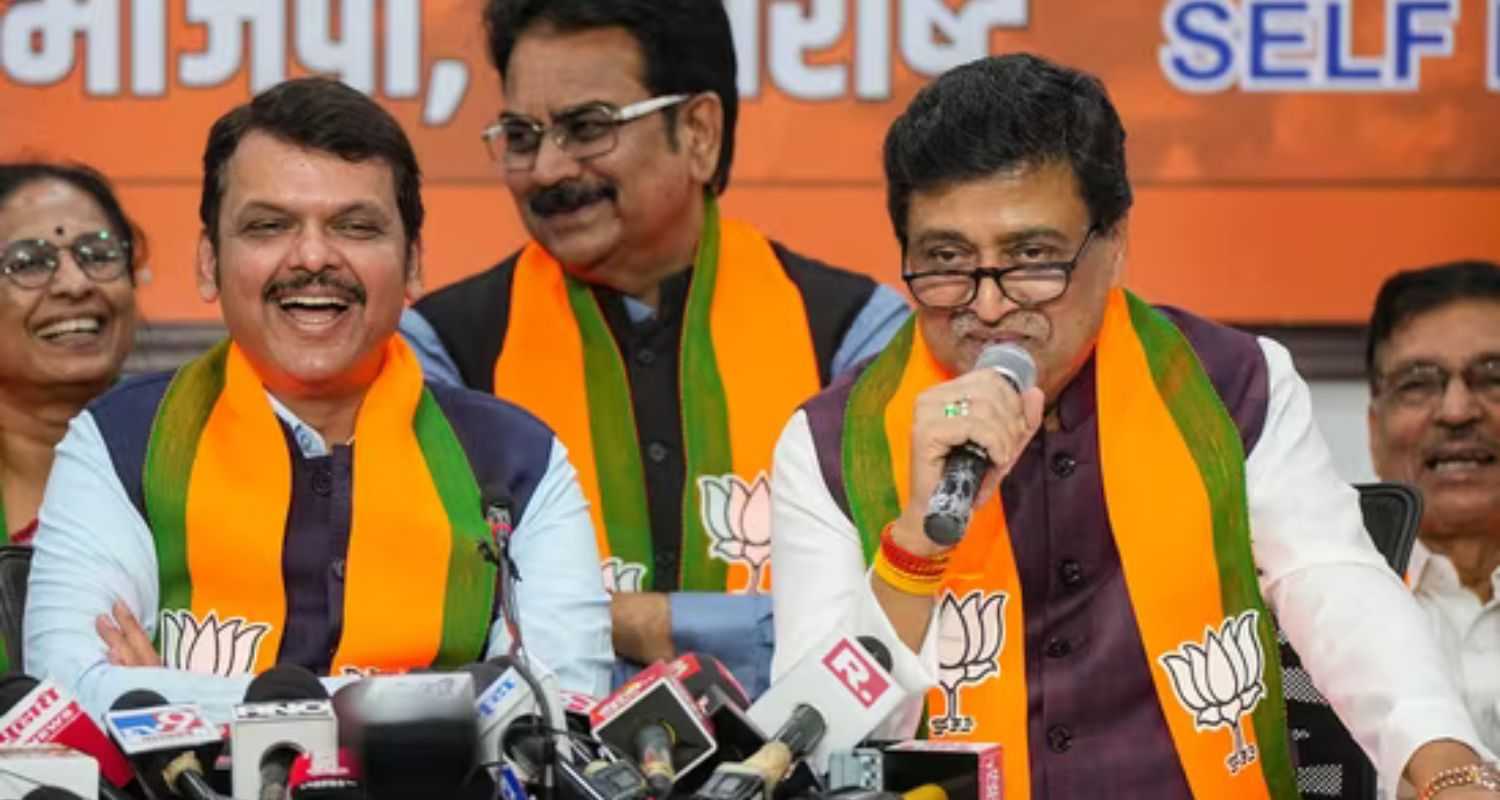 Former Maharashtra CM and Congress leader Ashok Chavan with Maharashtra Deputy Chief Minister Devendra Fadnavis addresses media after joining BJP, in Mumbai on Tuesday