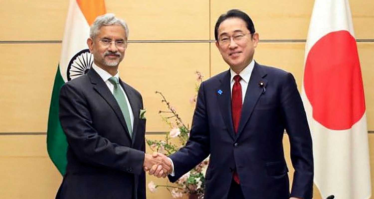 EAM S Jaishankar shaking hands with Japanese PM Fumio Kishida.