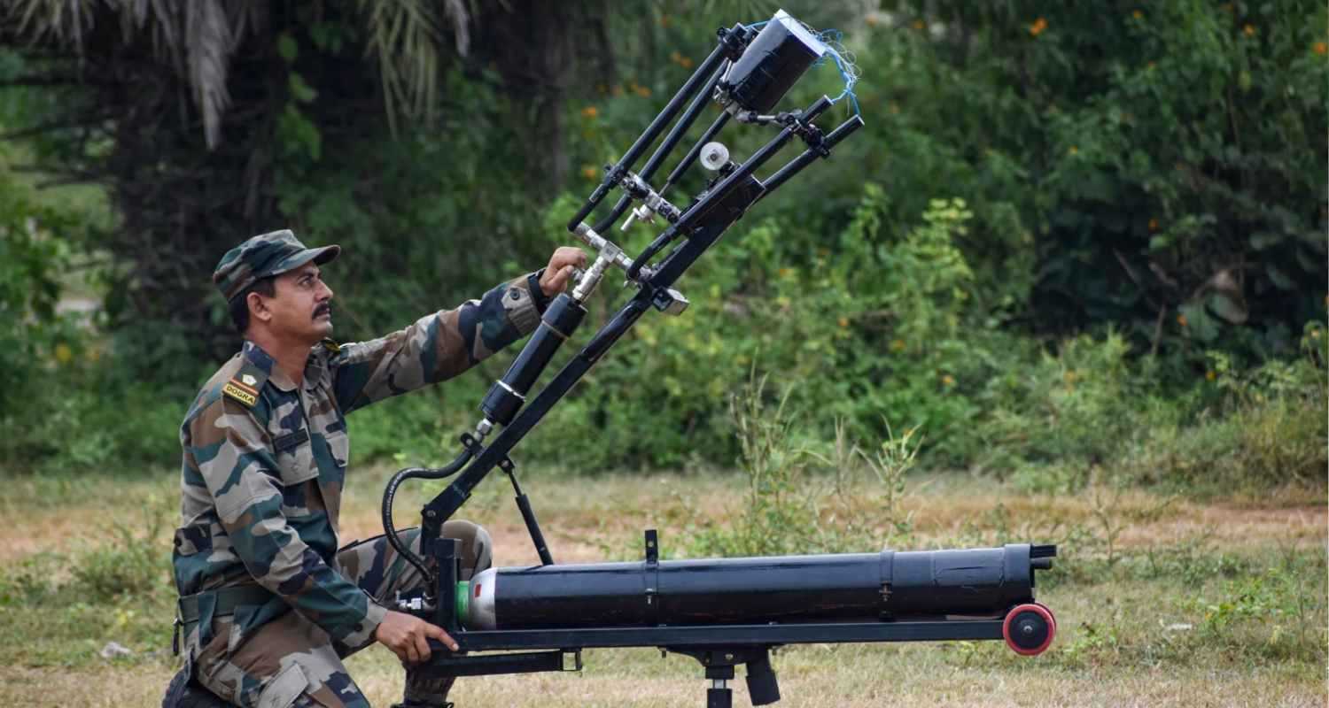 A jawan handles an equipment during conclusion of Indian Army's integrated fire and manoeuvre training exercise 'Swavlamban Shakti', at the Babina Field Firing Range in Jhansi, Uttar Pradesh, Tuesday. 