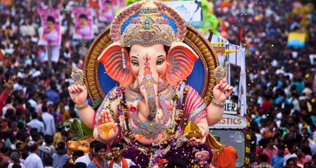 Devotees celebrate on the streets of Mumbai, the start of the Ganesh festival in Maharashtra with vibrant processions and festive cheer, bringing Lord Ganesh home with traditional rituals and joy.