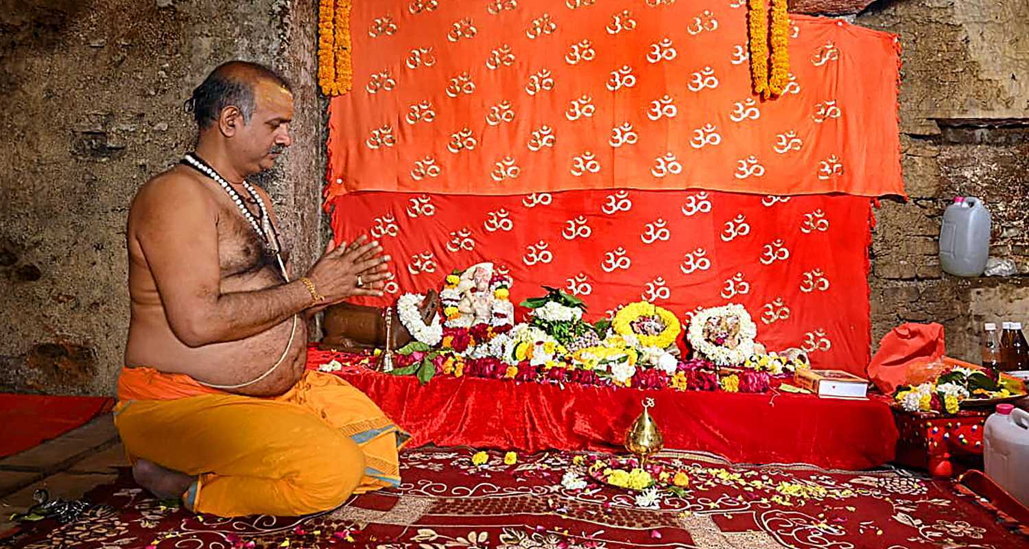 A Hindu pujari offers prayers in the Gyanvapi mosque cellar after a long legal battle
