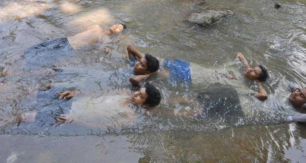 Children trying to beat the heat