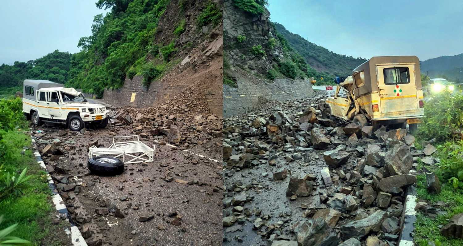 A vehicle damaged by boulders after landslide near Parwanoo, in Solan district, Monday, July 29, 2024. 