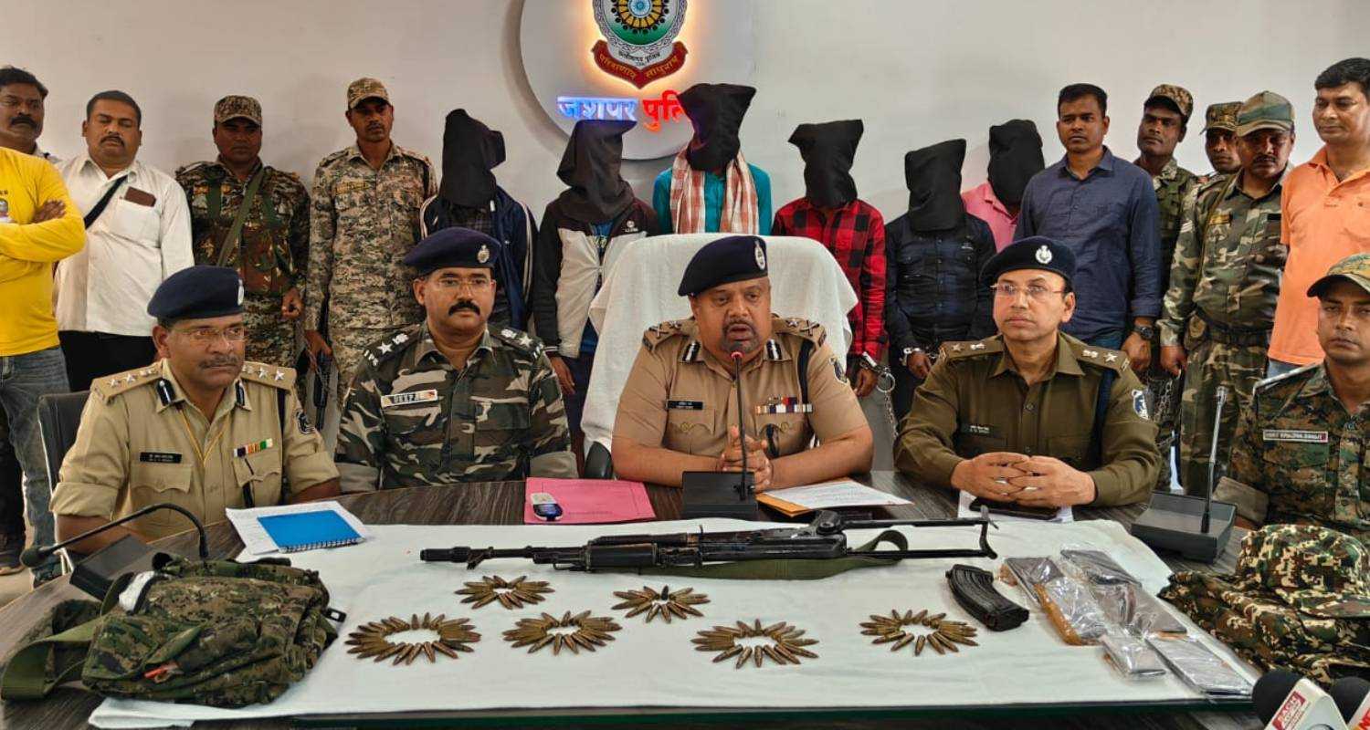 An image of Surguja range IG Ankit Garg with the Apprehended Naxal rebels behind him.