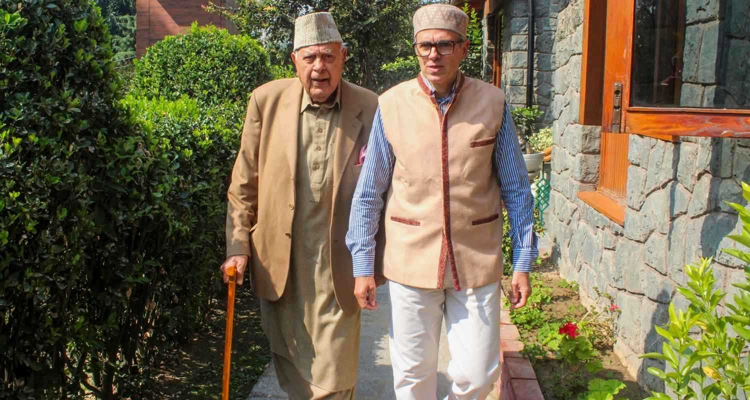 Two generations take a victory walk: JKNC President Farooq Abdullah and Vice President Omar Abdullah at their residence in Srinagar.