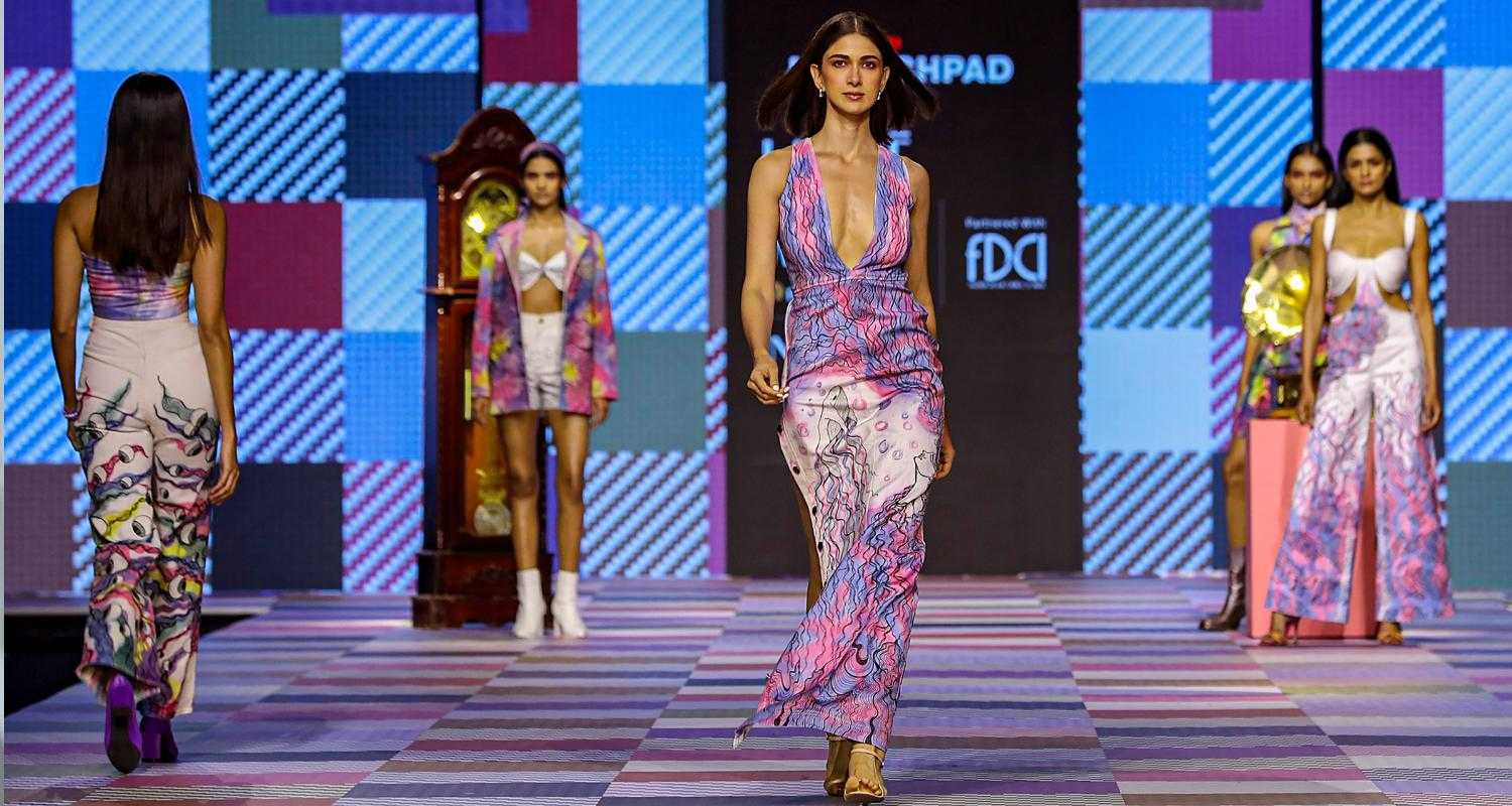 Models walk the ramp presenting the creations of the students of Inter National Institute of Fashion Design (INIFD) during the Fashion Design Council of India (FDCI) X Lakme Fashion Week (LFW), in Mumbai.