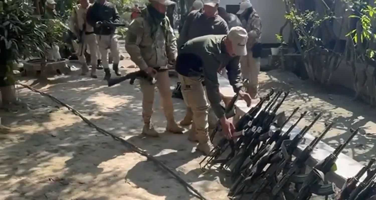 Manipur Police commandos stage a symbolic protest, laying down their arms in response to the abduction of Additional Superintendent Amit Kumar Moirangthem in Imphal, Manipur on Wednesday.