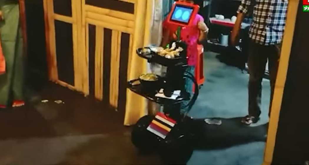 The robot conducting trials in a restaurant. 