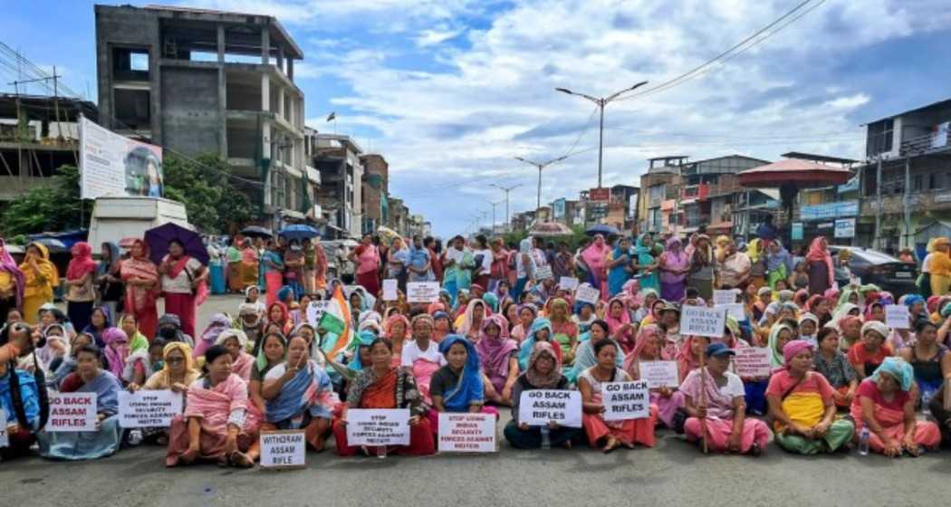 Meitei women block a road in Imphal during a protest against the Assam Rifles in August last year.