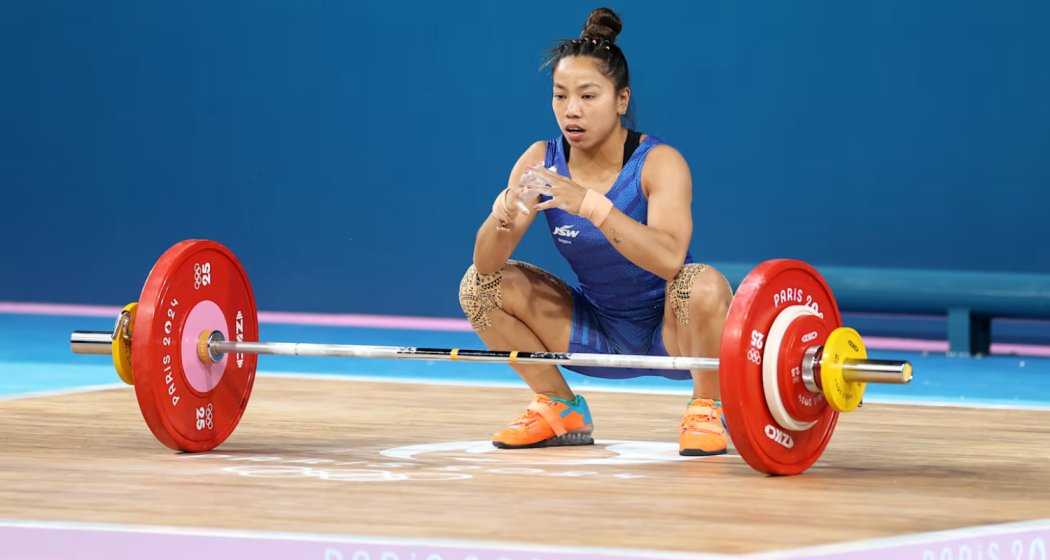 Indian weightlifter Mirabai Chanu in action during the 2024 Paris Olympics.