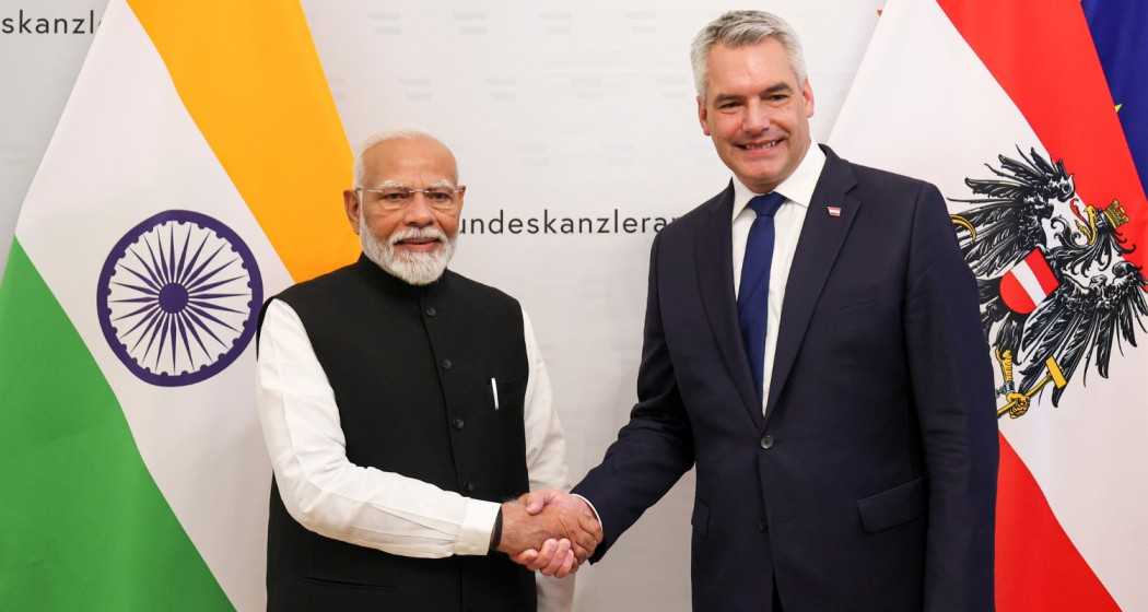 Prime Minister Narendra Modi being greeted by Austrian Chancellor Karl Nehammer during the signing of guest book, in Vienna, Austria, Wednesday, July 10, 2024.