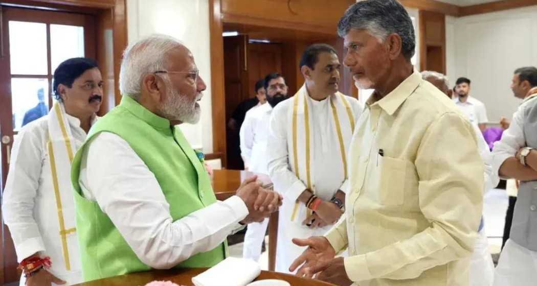 Caretaker Prime Minister Narendra Modi with TDP Chief N Chandrababu Naidu during a meeting in New Delhi. 