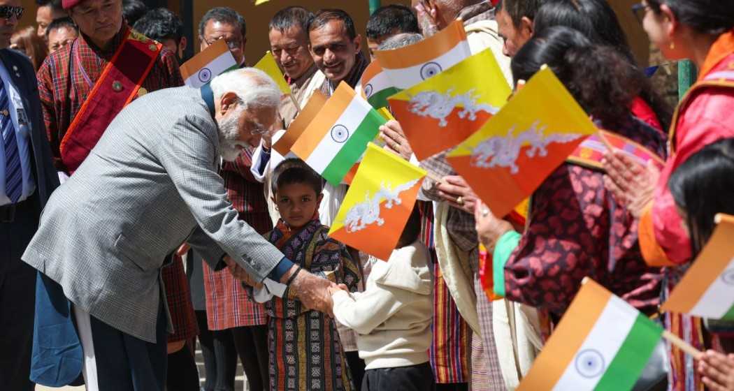 Prime Minister Narendra Modi interacting with children during his visit to Bhutan on Friday.