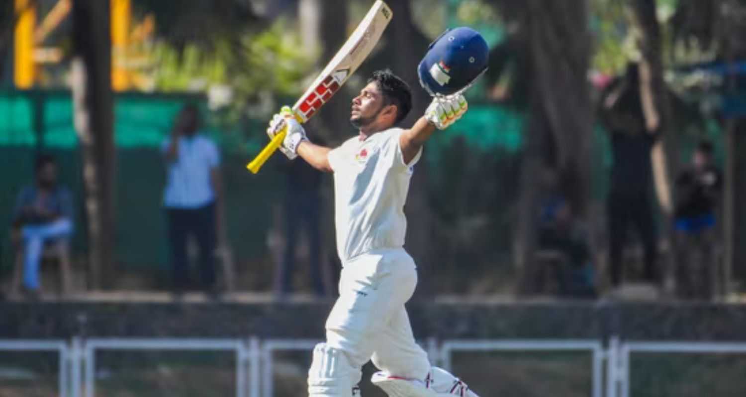 Mumbai batter Musheer Khan celebrates his century during a Ranji Trophy match between Mumbai and Baroda.