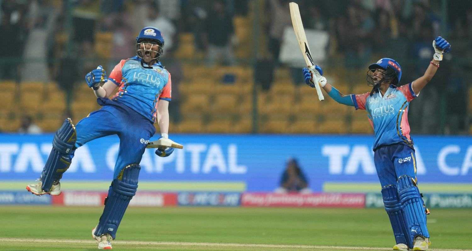 Mumbai Indian batswomen Yasika Bhatia celebrates with skipper Harmanpreet Kaur in Bengaluru