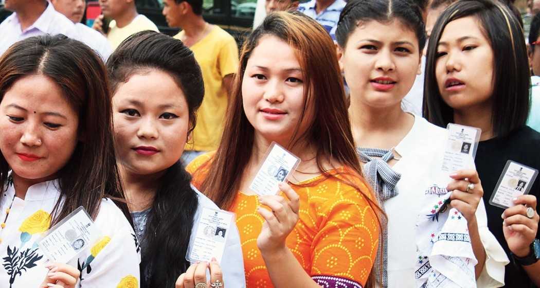 Voters with voter identity cards at a polling booth. Image for representative use.