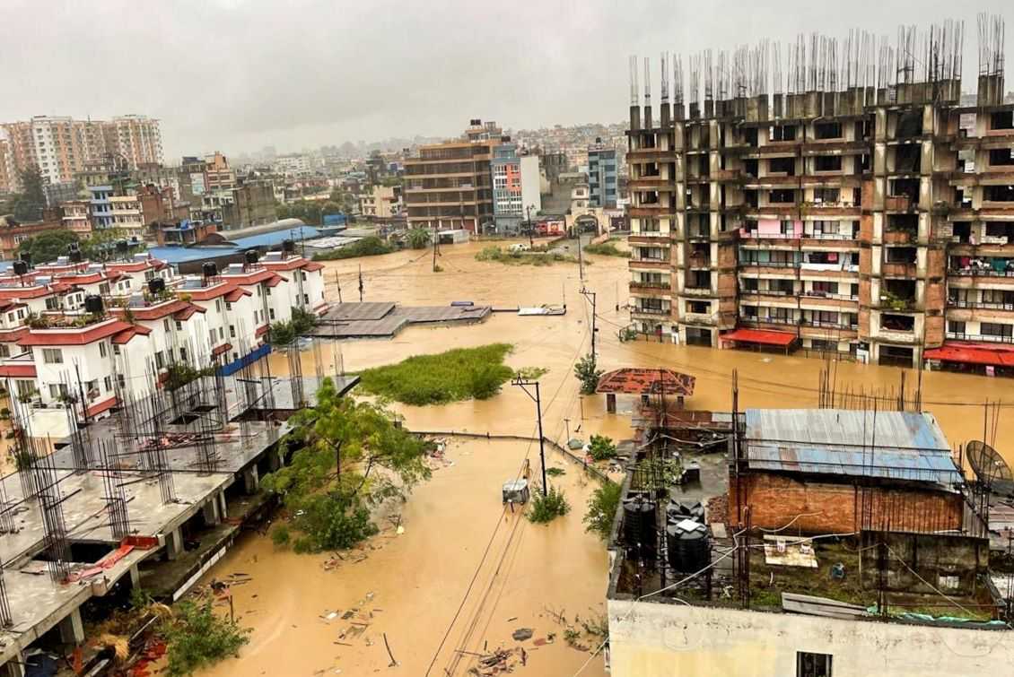 At least 19 people were killed when a bus was buried by a landslide in Dhading district bordering Kathmandu on Saturday. Five people died when a house collapsed under a landslide in the city of Bhaktapur and six football players were also killed by a landslide at a training centre operated by the All Nepal Football Association in Makwanpur. 