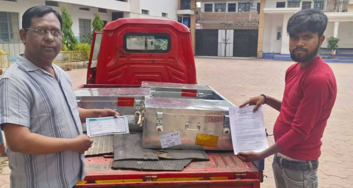 Dr. Ehsanul Haq, Principal of Oasis School, with the boxes containing the NEET question papers.