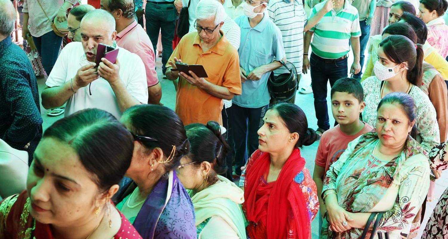 Kashmiri Pandit voters lined up at the polling station in Jammu during the Lok Sabha elections.