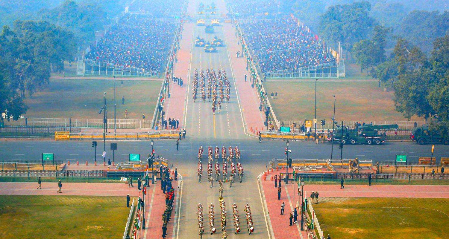 The Path of Duty: The Republic Day 2024 Parade on the Kartavya Path, formerly known as Jan Path, captured in an aerial shot. The band regiments lead from the front, followed by the Cavalry regiment. At the back of the initial teams are the Indian Army's tanks, specially engineered for all terrains.