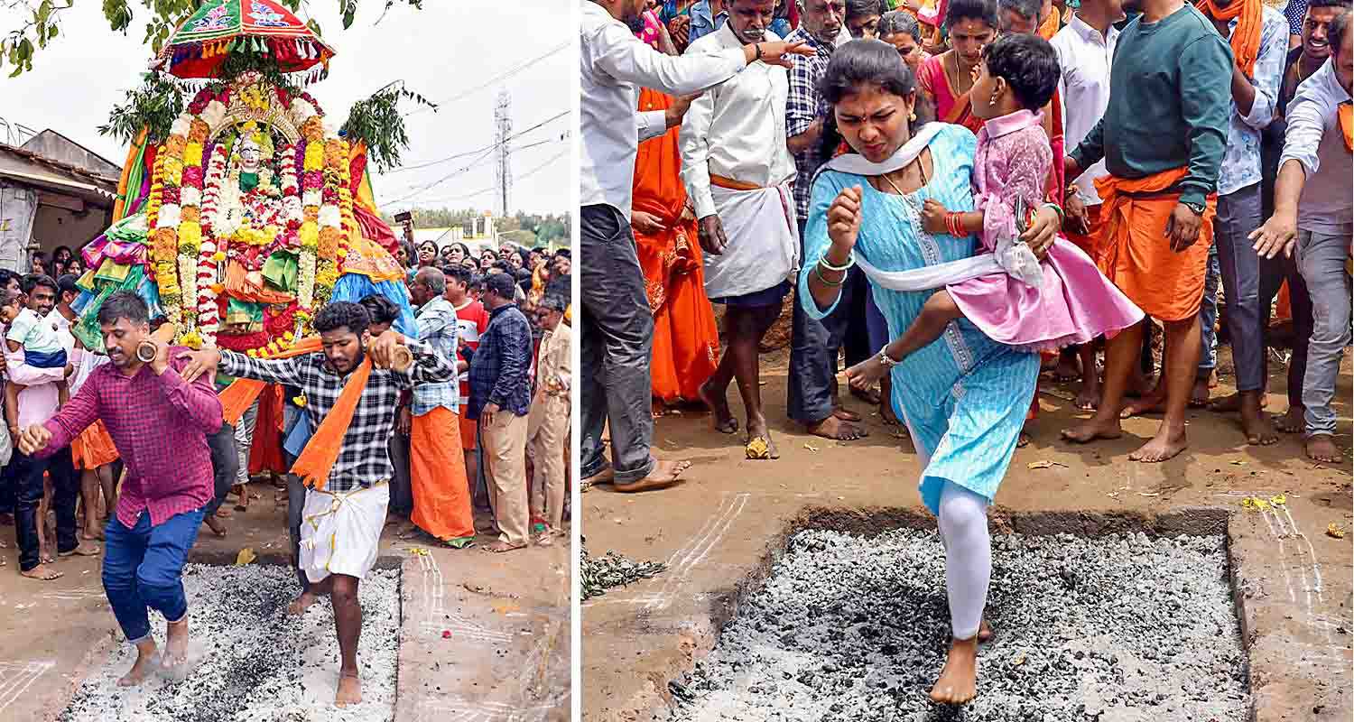 Devotees walk on embers during the Shaneshwara Temple Kendotsava, near Chikkamagaluru on Saturday