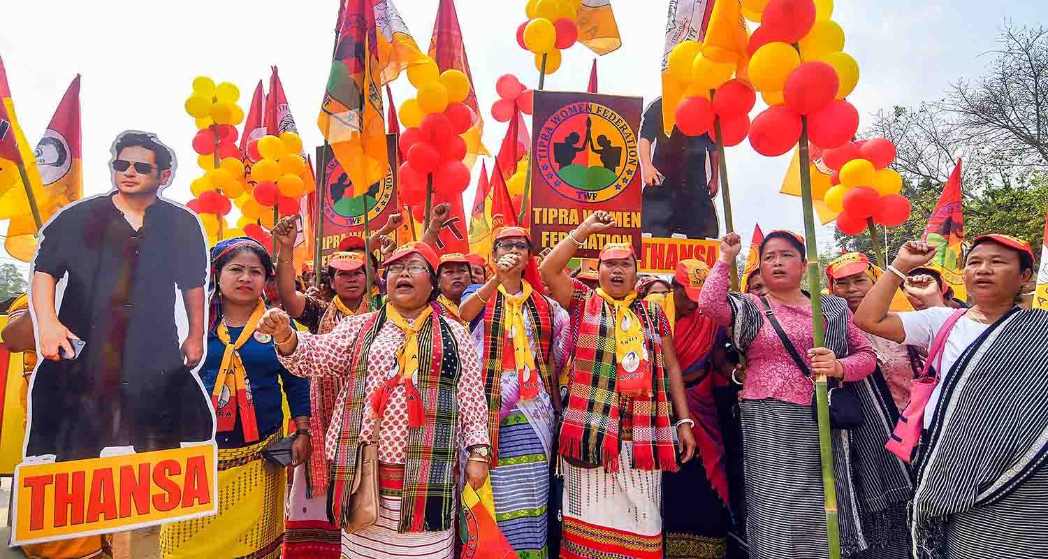 Tipra Motha Party (TMP) supporters raise slogans during NDA candidate for East Tripura Parliamentary constituency Kriti Devi Singh Deb Barman's nomination filing procession, in Agartala, Thursday.