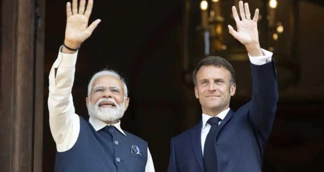 Prime Minister Narendra Modi (L) and France's President Emmanuel Macron attend a meeting at the Ministry of Foreign Affairs in Paris on July 14, 2023.