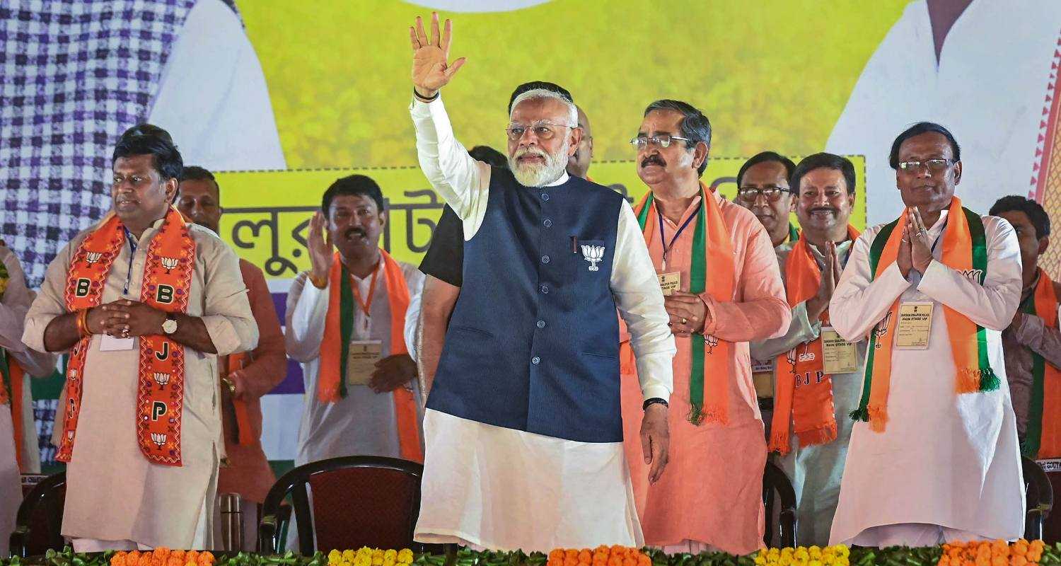 Prime Minister Narendra Modi with BJP candidate Sukanta Majumdar. 