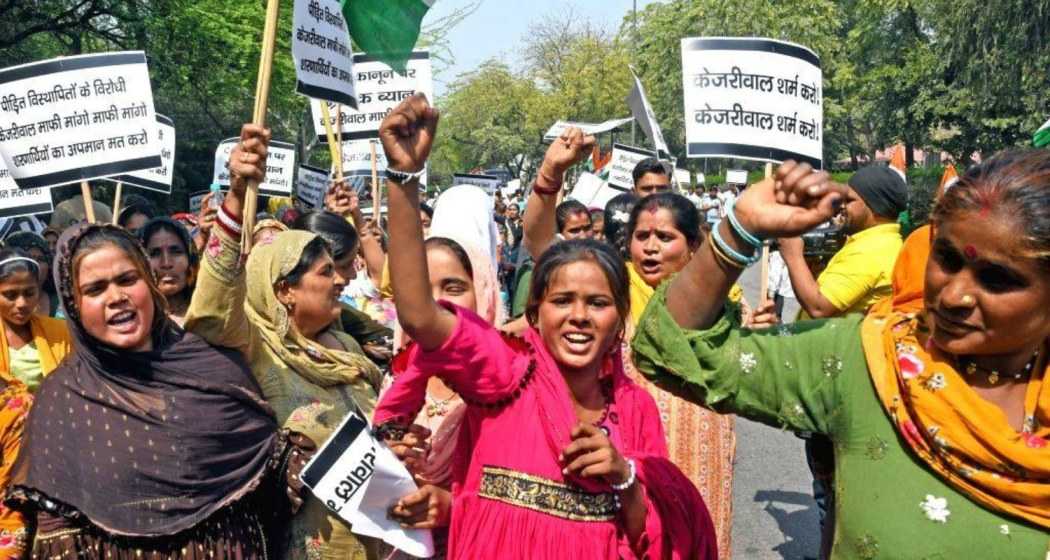 Hindu refugees from Pakistan stage protest outside Delhi CM Arvind Kejriwal's residence over his remarks on CAA, in New Delhi on Thursday.