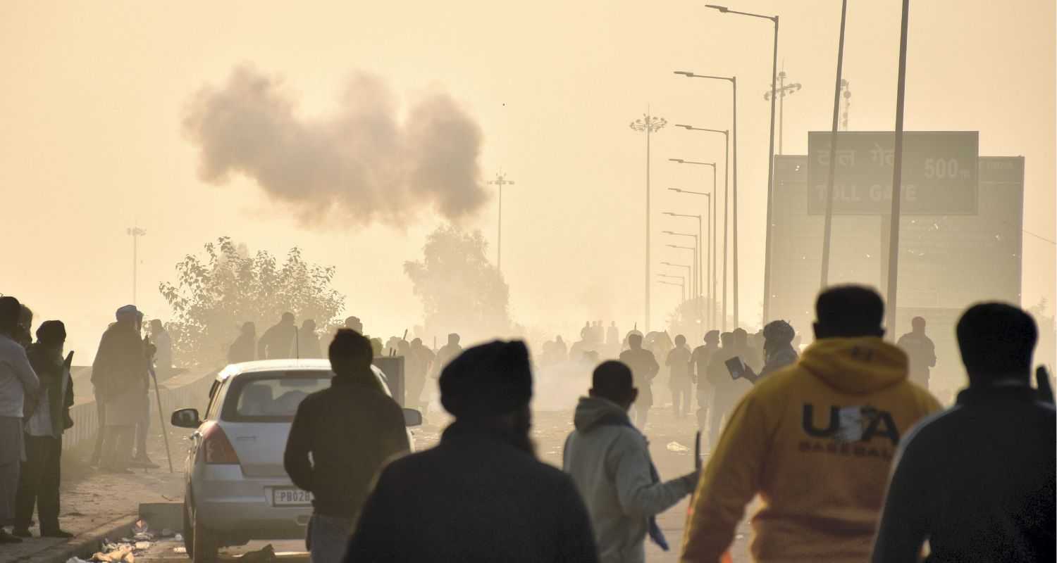 Protestors at the Delhi border amid tear gas shelling and violence.