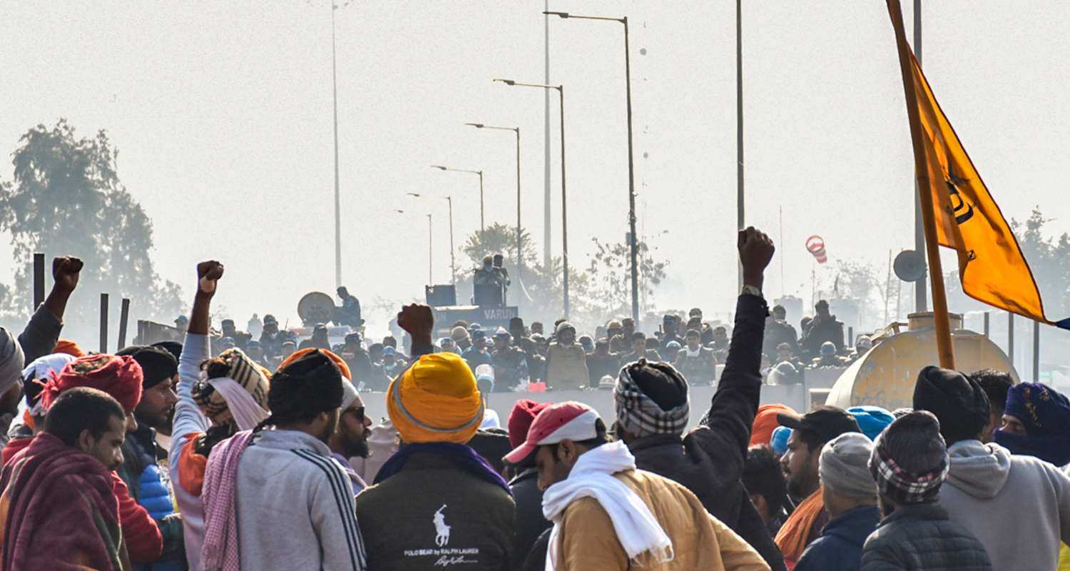 Protestors face off against security forces at the Shambhu border.