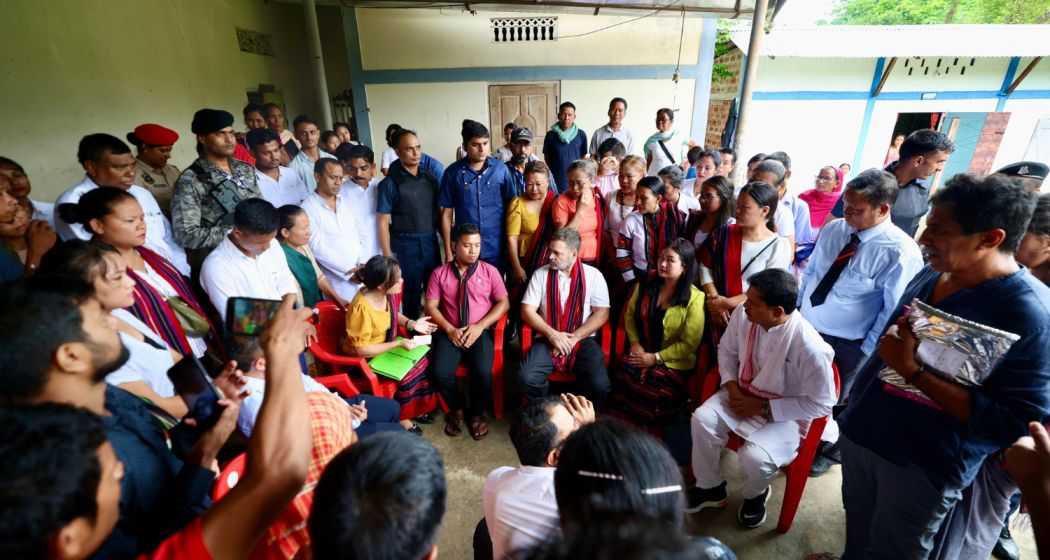 Leader of Opposition Rahul Gandhi engages with flood victims during a visit to a relief camp in Fulertal, Cachar district, Assam.