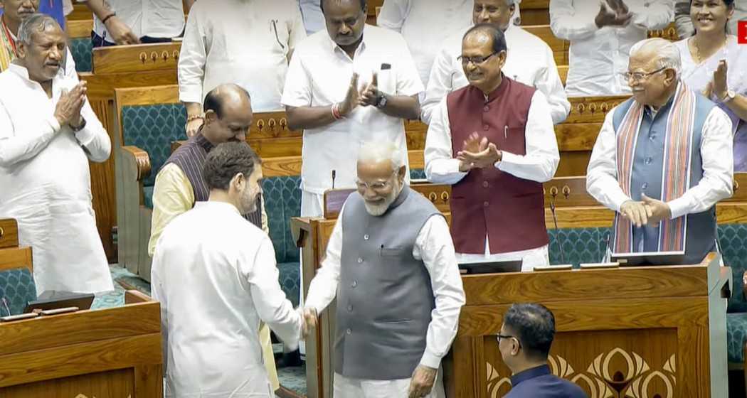 Prime Minister Narendra Modi and Leader of the Opposition Rahul Gandhi escort Om Birla to the chair after the latter was elected as the Speaker of the House during the first session of the 18th Lok Sabha, in New Delhi, Wednesday, June 26, 2024.