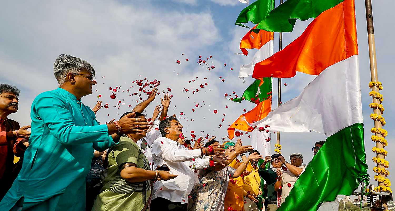 People pay floral tribute to Hindu saint Maneknath on his birth anniversary, at Manek Burj in Ahmedabad, Gujarat