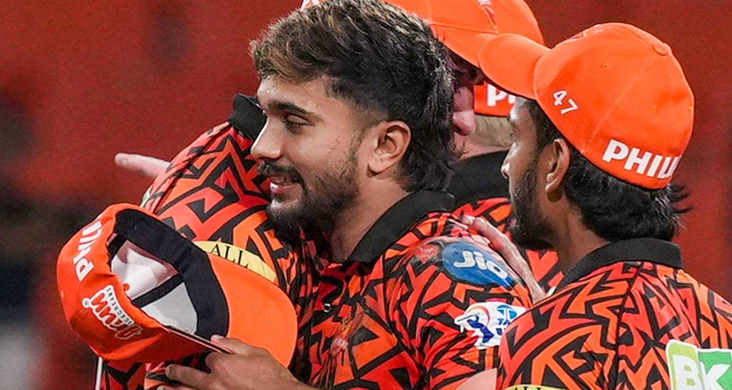 Sunrisers Hyderabad's Nitish Kumar Reddy with captain Pat Cummins. 