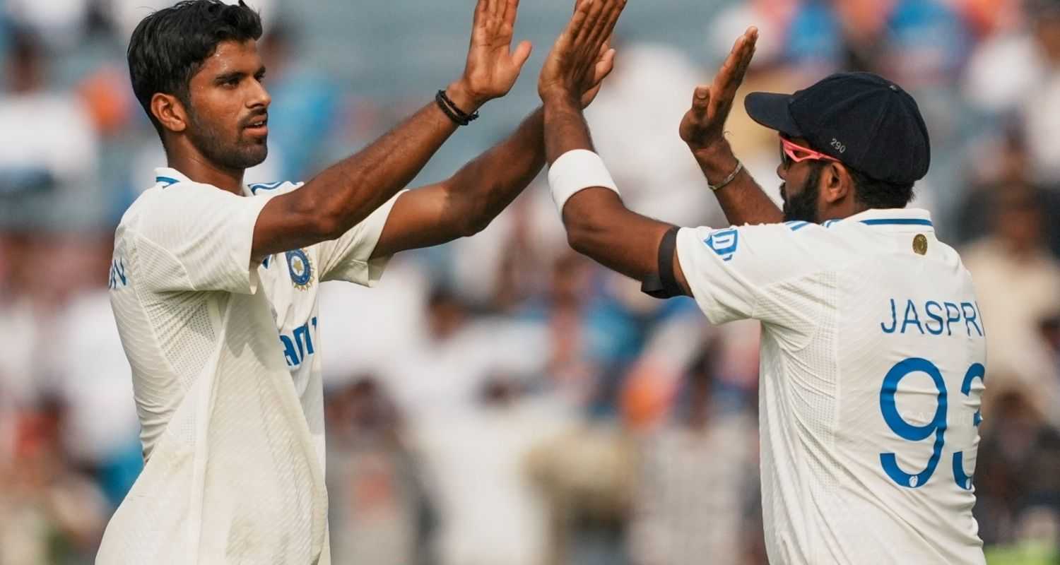 India's Washington Sundar celebrates with captain Rohit Sharma and Ravindra Jadeja after taking the wicket of New Zealand's Rachin Ravindra on the first day of the second test cricket match between India and New Zealand, at the Maharashtra Cricket Association Stadium, in Pune.