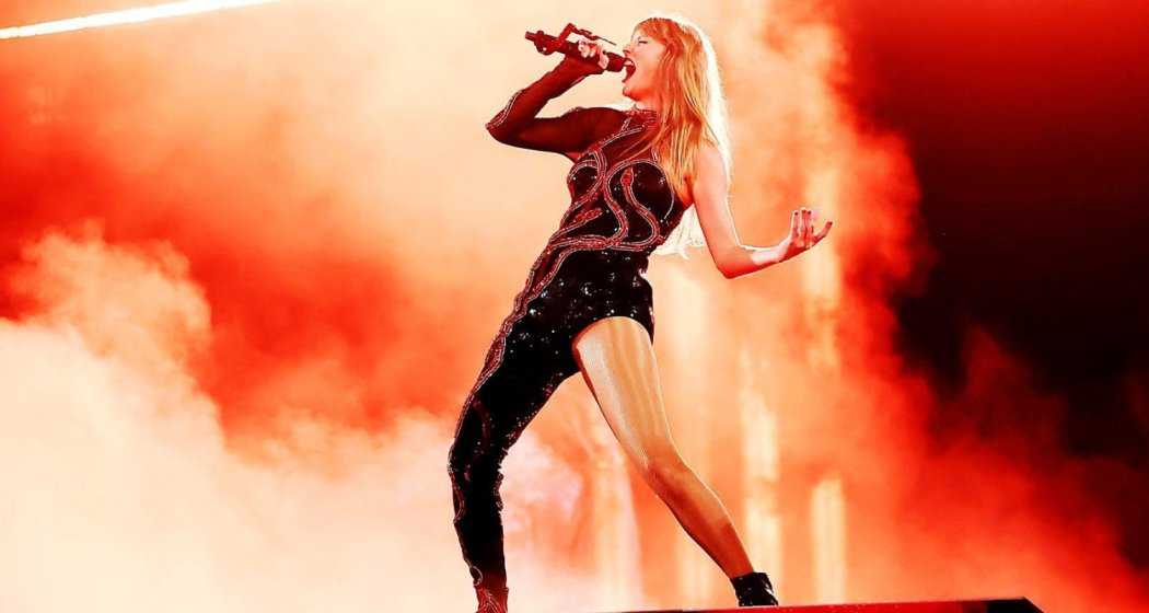 Taylor Swift captivates the audience during a live concert performance.