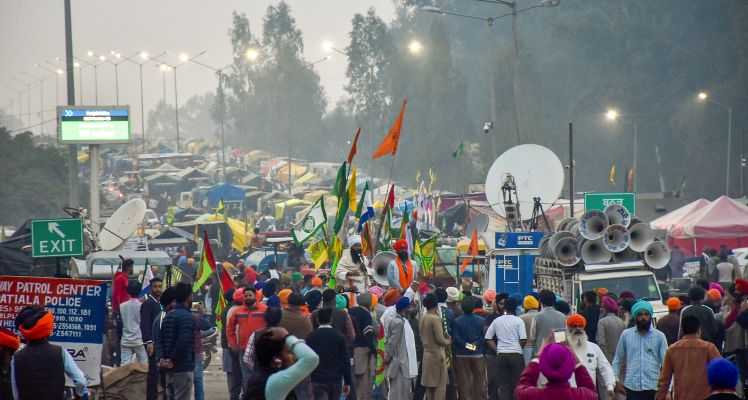 A view of the farmers with their tractors and trolleys parked on a highway during the ongoing farmers' protest over various demands, including a legal guarantee of minimum support price (MSP) for crops, at the Punjab-Haryana Shambhu Border, in Patiala district. 